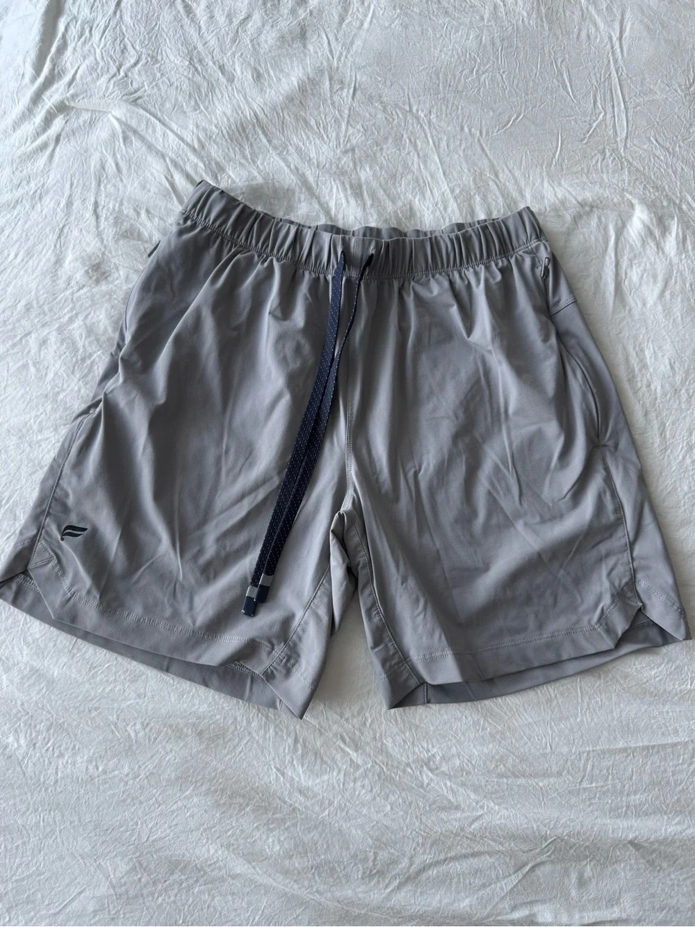 Fabletics Men's Light Gray Athletic Shorts with Navy Drawstring